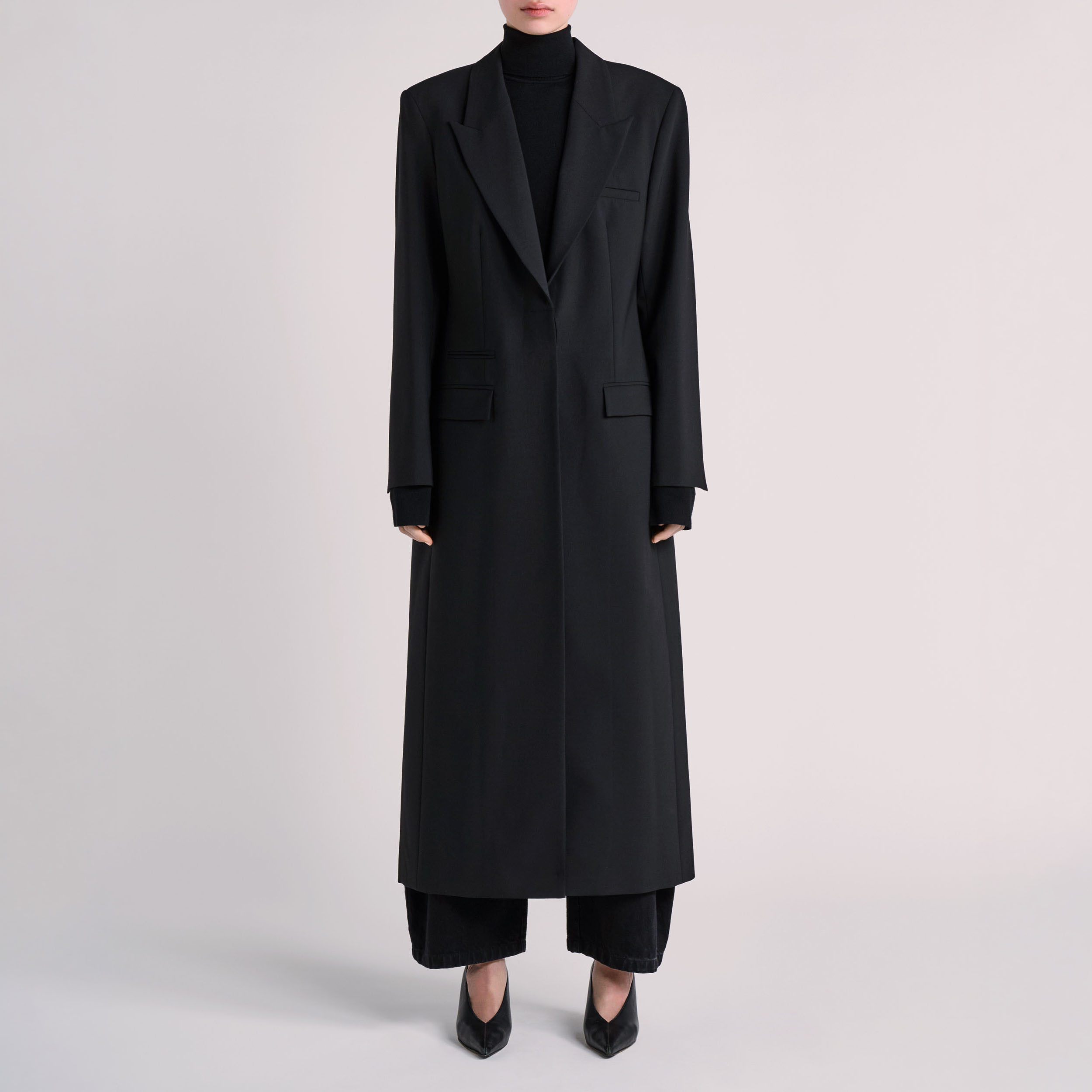 Front view of ESSE coat photographed for fashion e-commerce