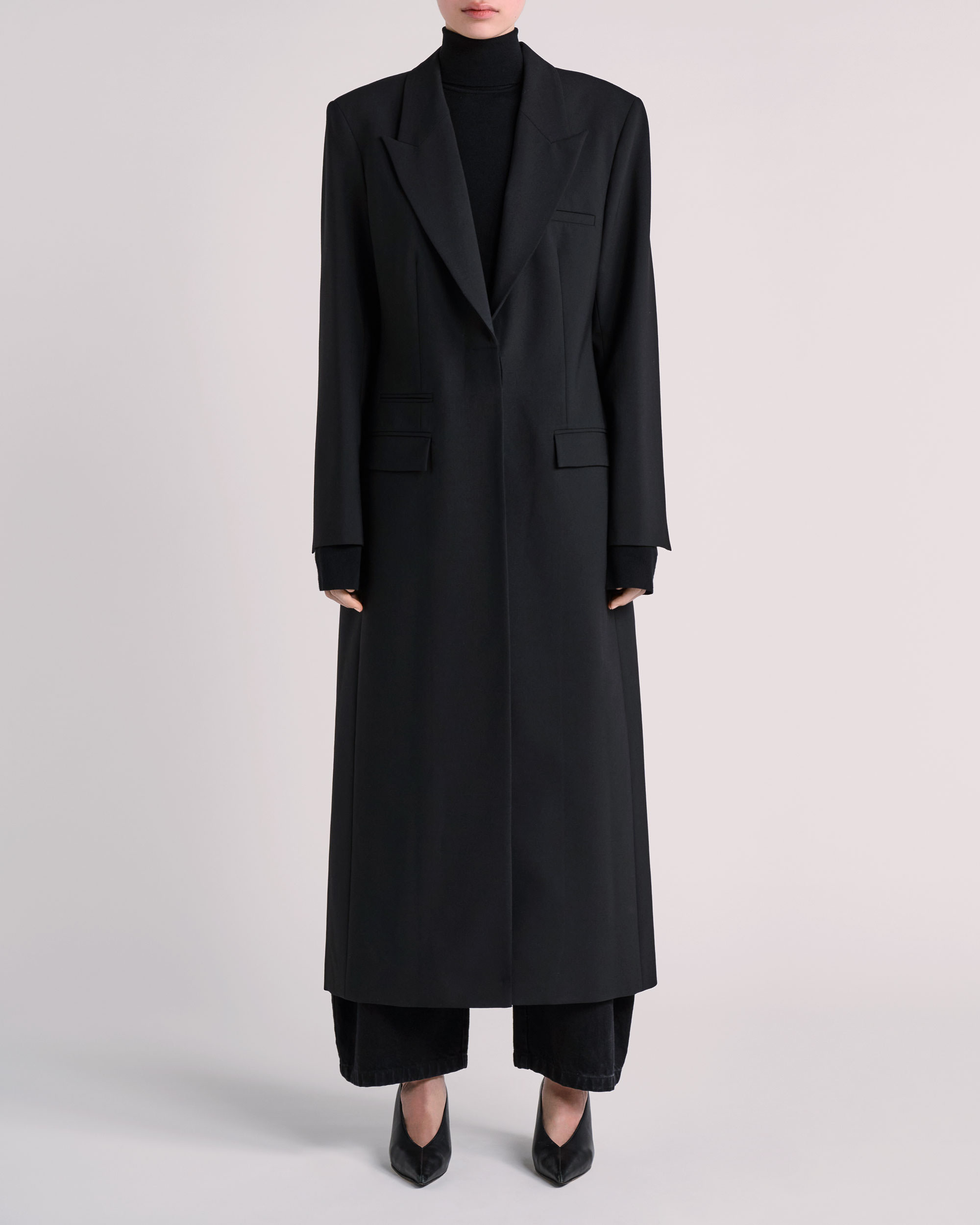 Front view of ESSE coat photographed for fashion e-commerce