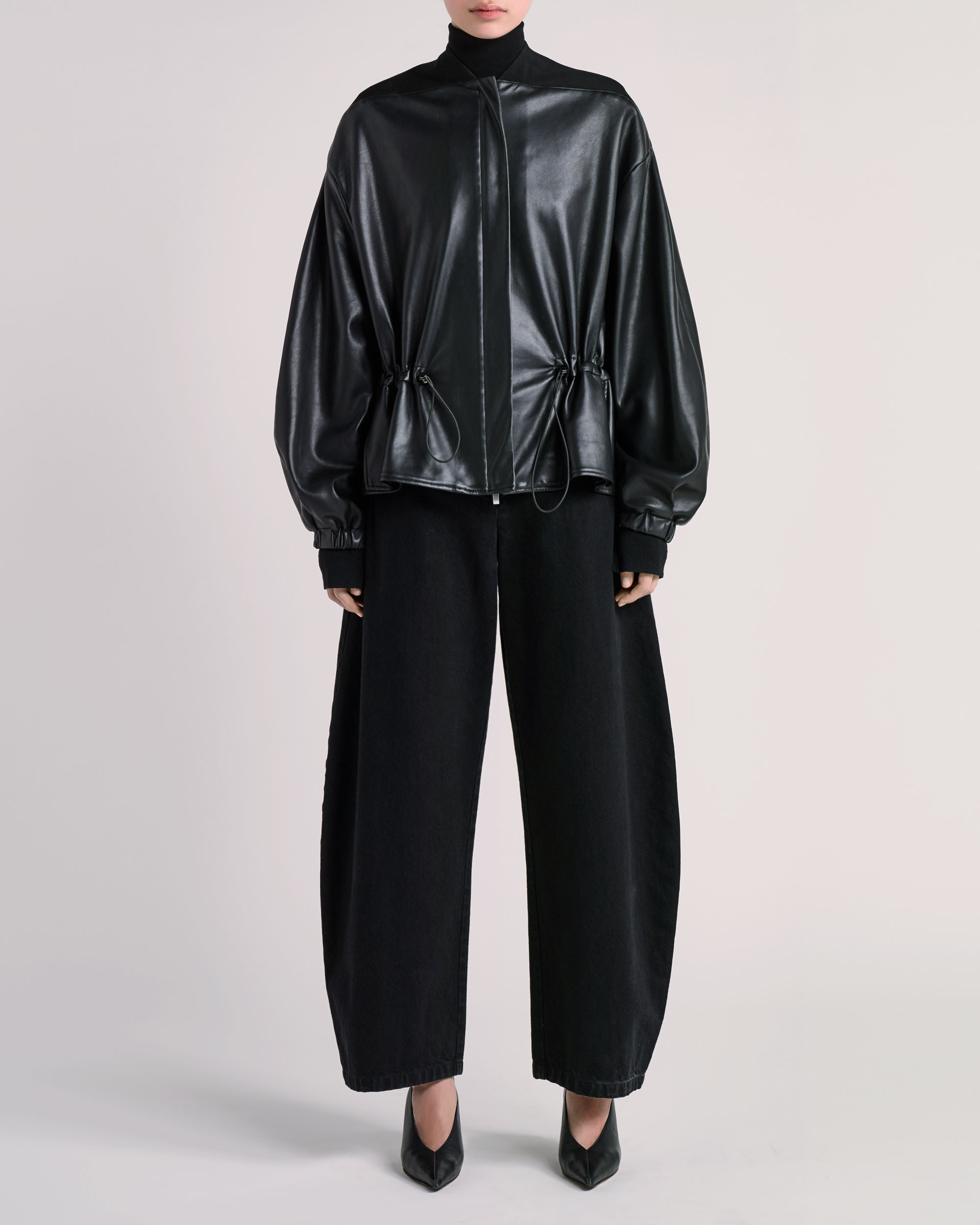 Front view of ESSE jacket photographed for fashion e-commerce