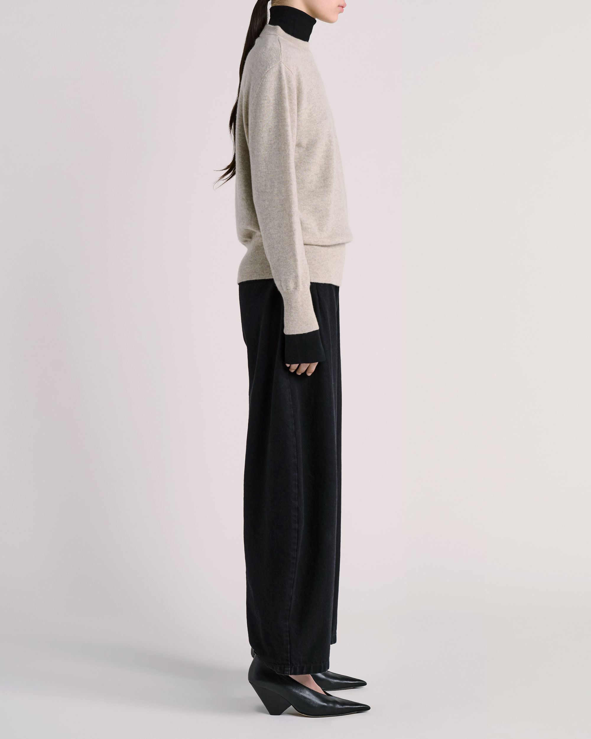 Side view of ESSE knitwear photographed for fashion e-commerce