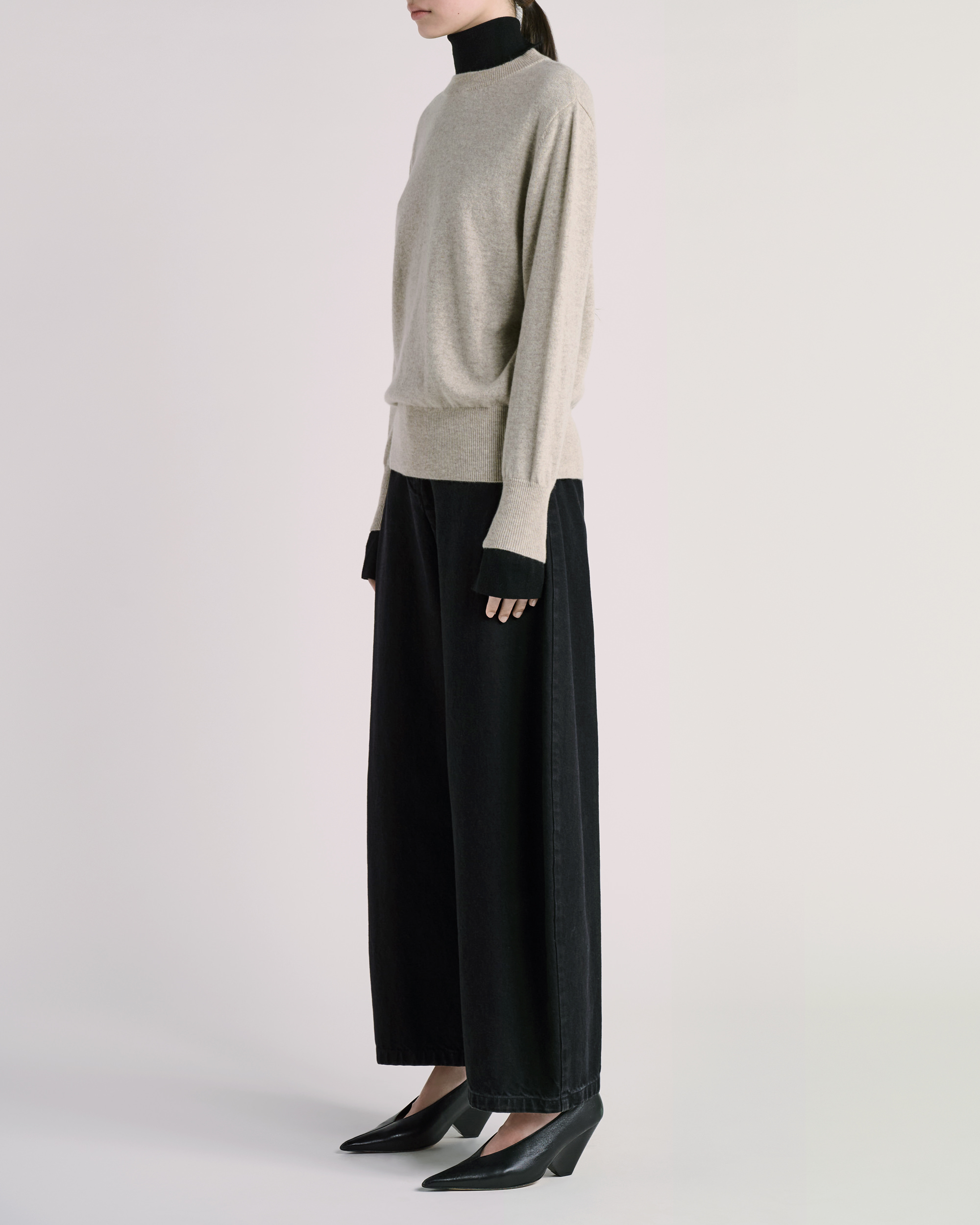 Front 3-4 view of ESSE knitwear photographed for fashion e-commerce
