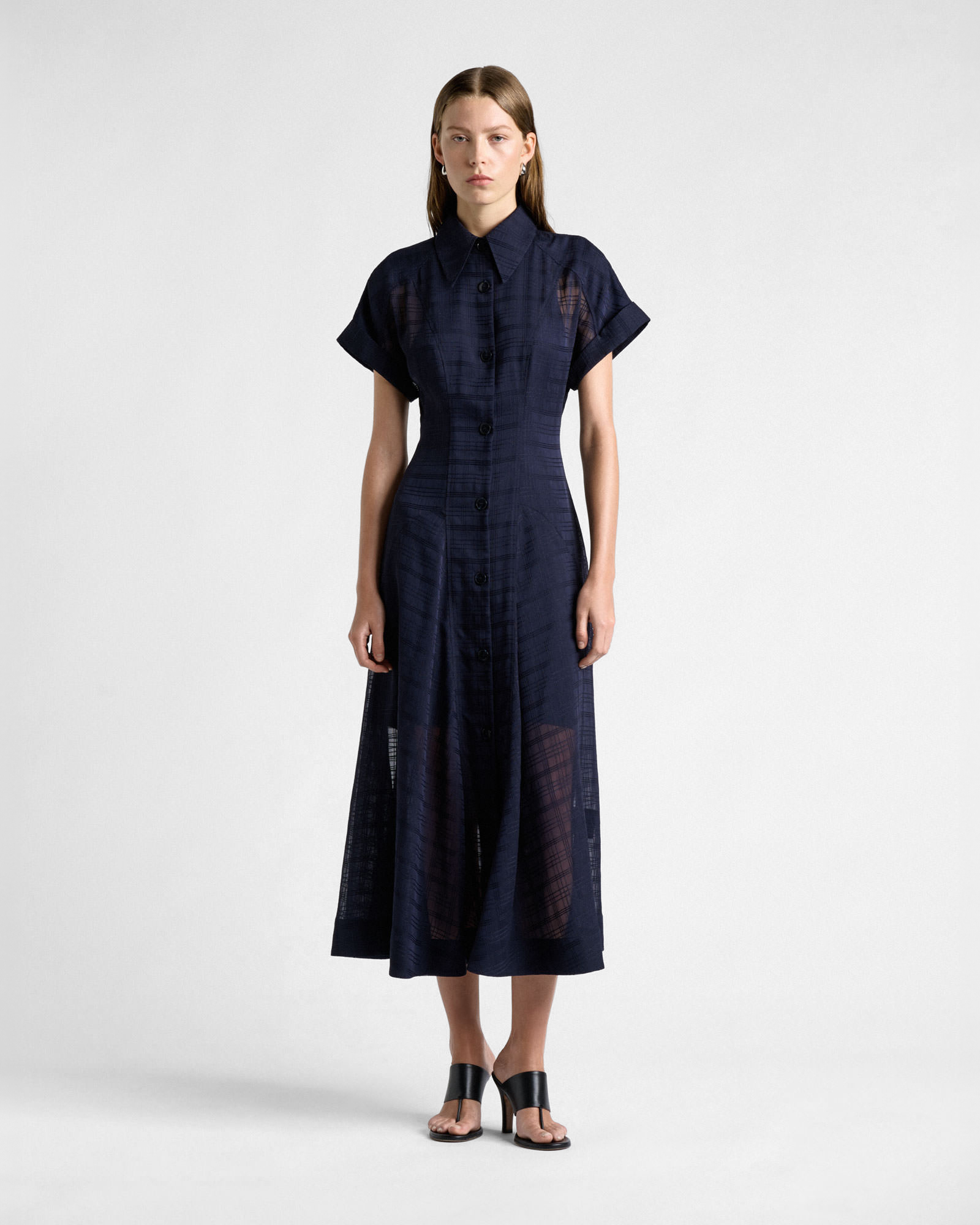 Front view of a Veronika Maine navy dress photographed for fashion e-commerce