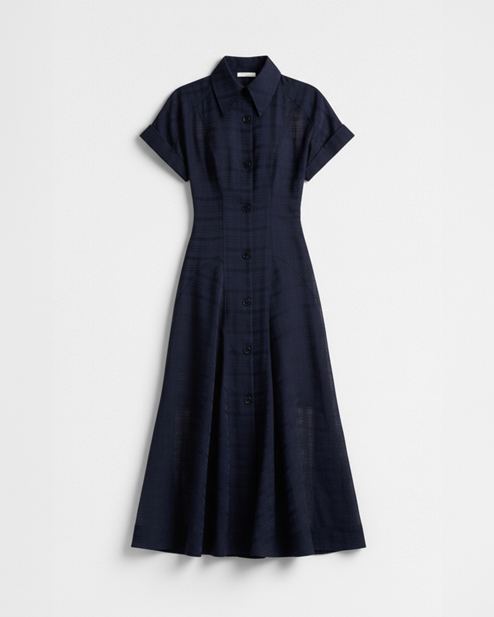 Flatlay photograph of a Veronika Maine navy dress front view