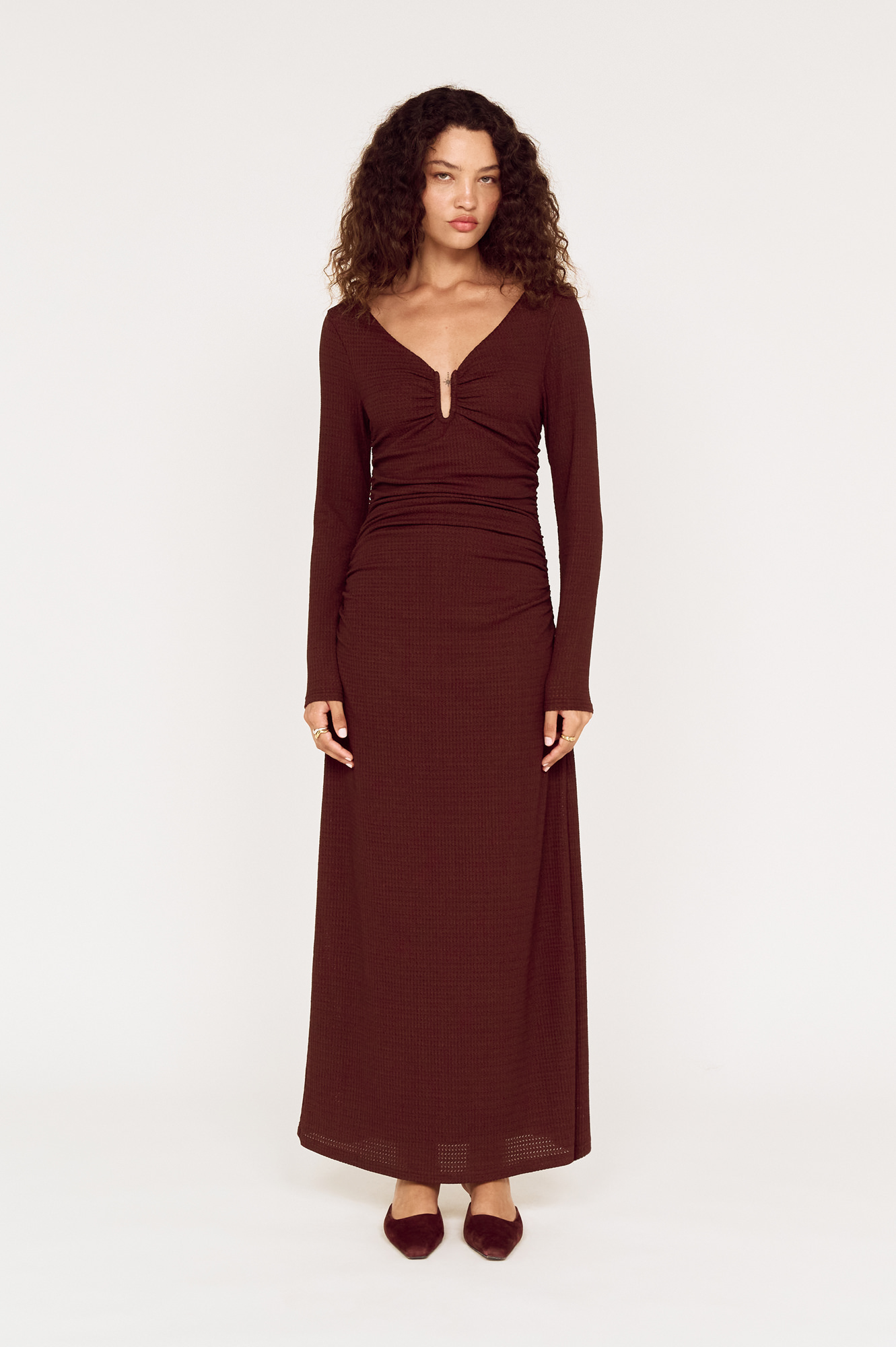 Front view of a model wearing a MINKPINK brown wrap maxi dress photographed for fashion e-commerce by Shoot.Studio in Sydney.