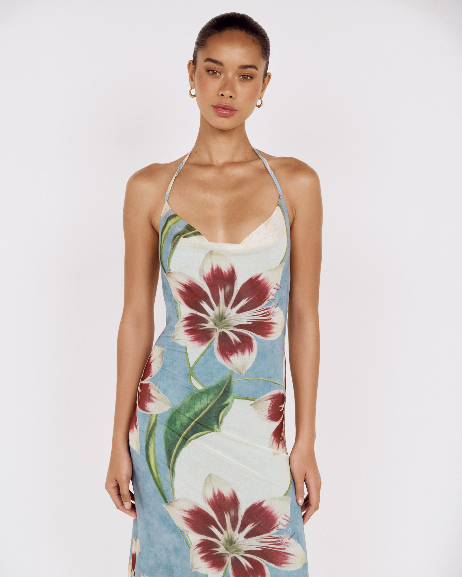 Detail view of a model wearing a MINKPINK floral halter maxi dress, photographed for fashion e-commerce by Shoot.Studio in Sydney.