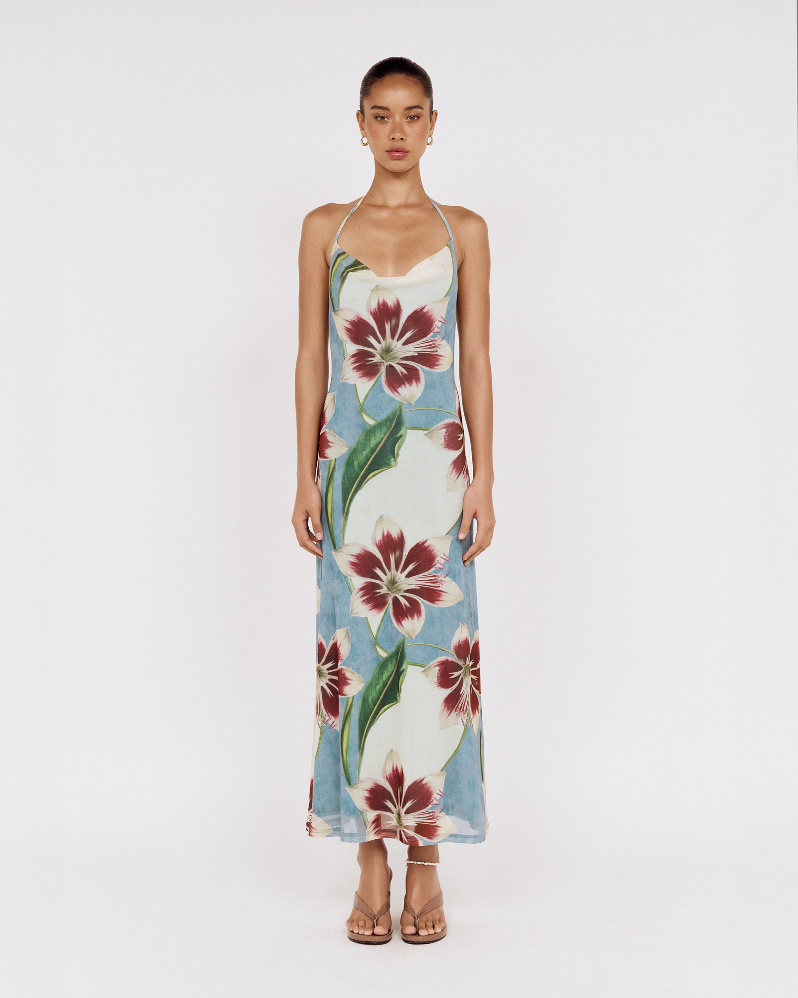 Front view of a model wearing a MINKPINK floral halter maxi dress, photographed for fashion e-commerce by Shoot.Studio in Sydney.