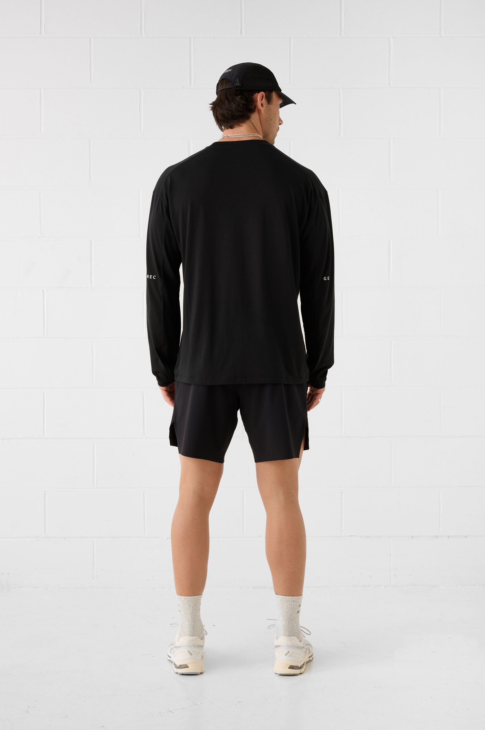 REC GEN men's black long-sleeve activewear set, full-length back view