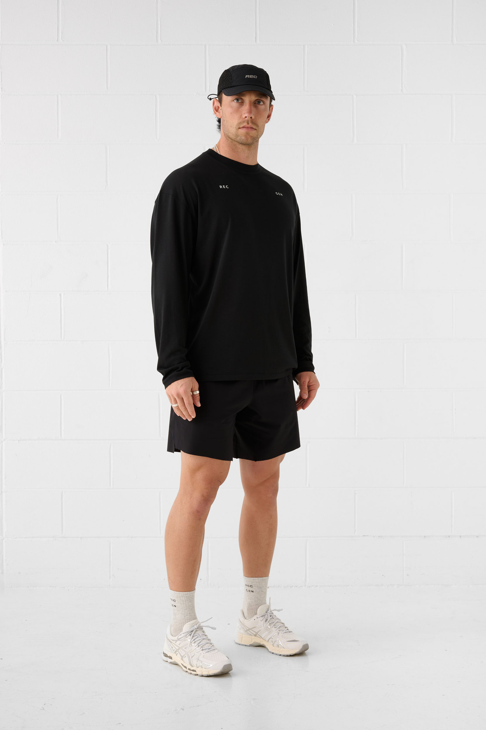 REC GEN men's black long-sleeve activewear set, full-length side view
