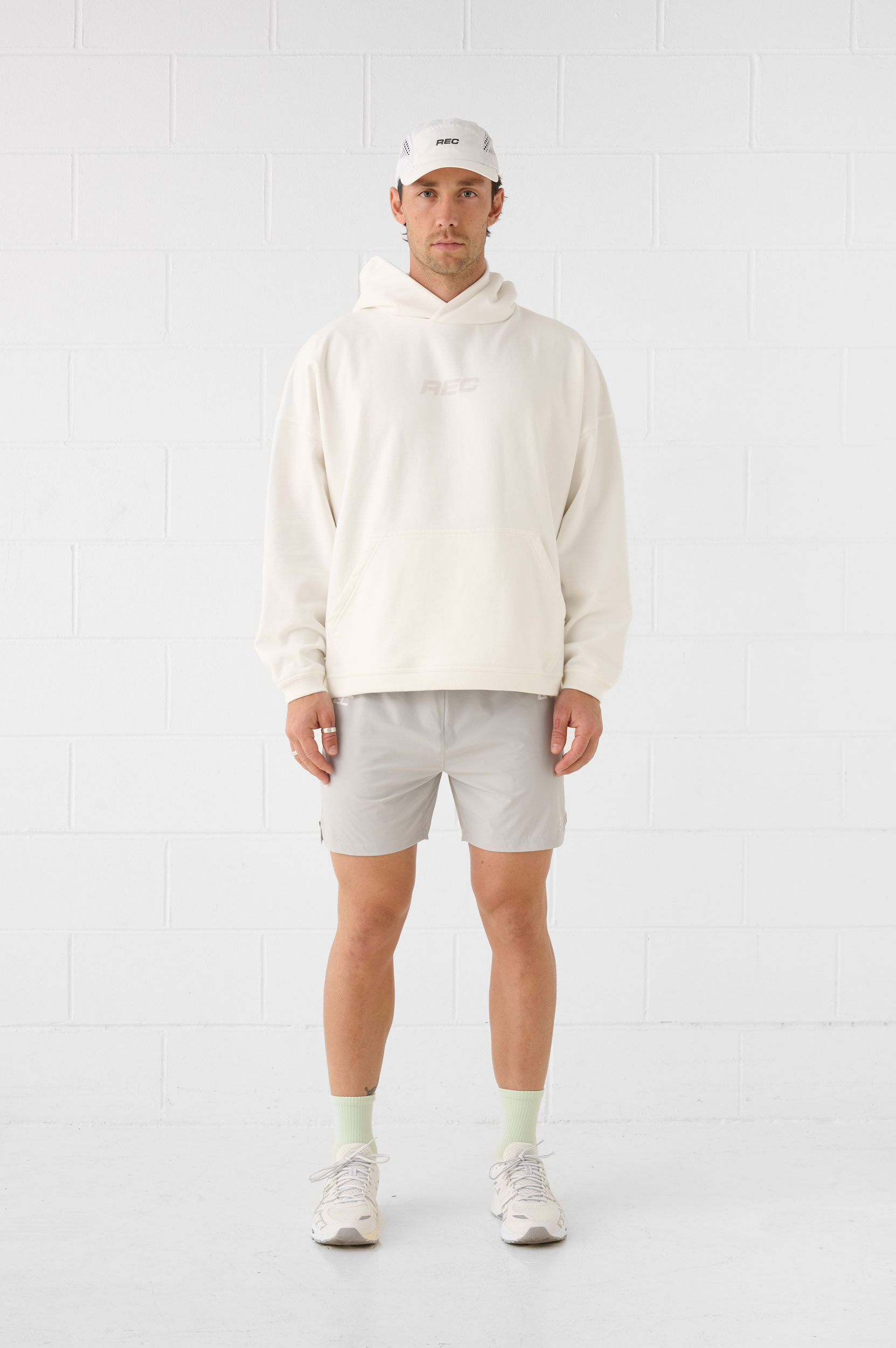 REC GEN men's cream hoodie and grey shorts, full-length front view